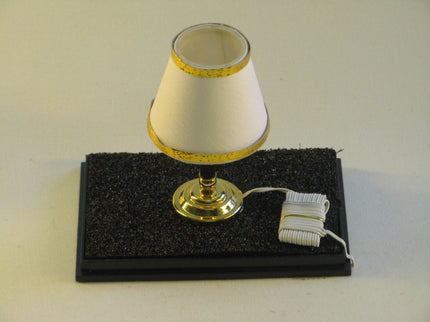 woo_src:https://woo.ludibrium.ch/wp-content/uploads/2018/01/Mini%20Mundus%20-%20Tischlampe%201%3A12%205454.png