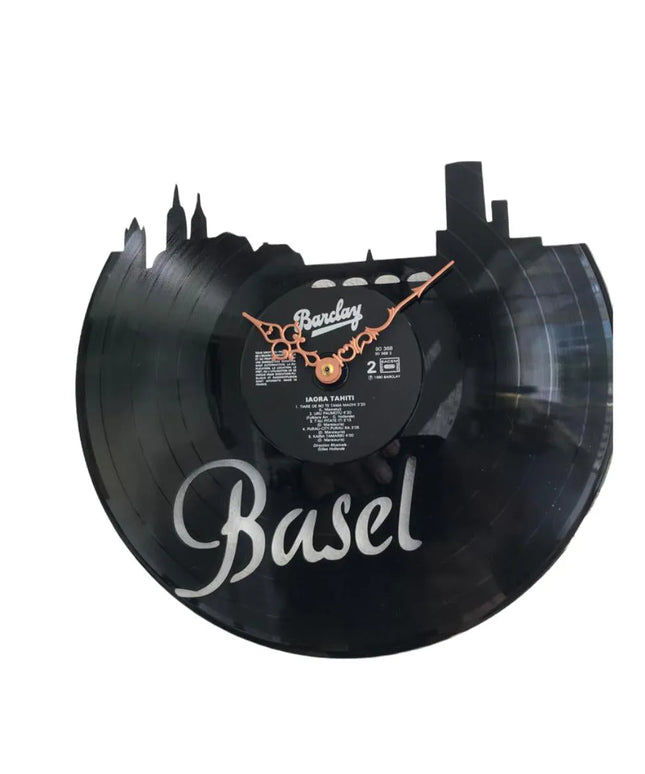 woo_src:https://woo.ludibrium.ch/wp-content/uploads/2021/03/ludibrium%E2%80%93Schallplatten-Wanduhr-Basel.jpg