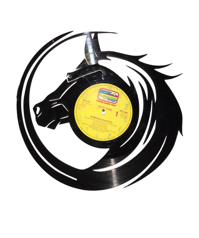 woo_src:https://woo.ludibrium.ch/wp-content/uploads/2022/01/ludibrium%E2%80%93Schallplatten-Wanduhr-Pferd.jpg