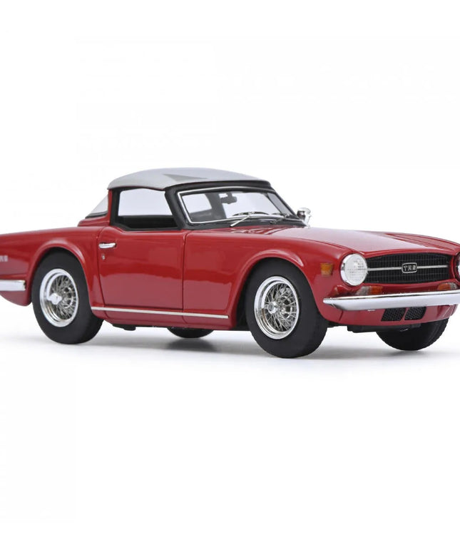 woo_src:https://woo.ludibrium.ch/wp-content/uploads/2023/01/ludibrium%E2%80%93schuco-triumph-tr6-rot2.jpg