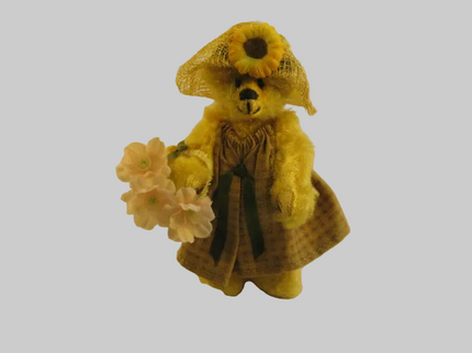 woo_src:https://ludibrium.ch/wp-content/uploads/2018/01/teddy-hermann-b%C3%A4r-mit-rock-und-strohhut.png