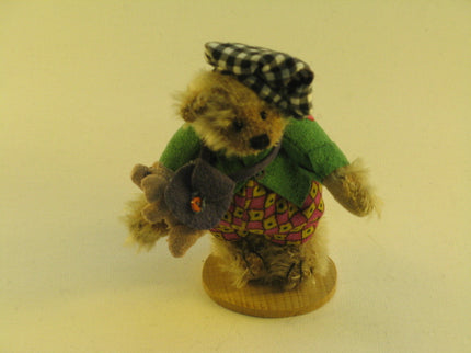 woo_src:https://woo.ludibrium.ch/wp-content/uploads/2018/01/teddy-hermann-tom%2C-tom-the-piper-s-son%2C-limitierte-edition.png